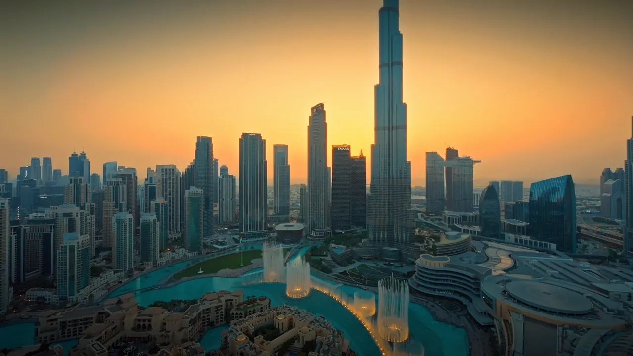 The Burj Khalifa and Downtown Dubai skyline at sunset, from the film produced for Address Downtown