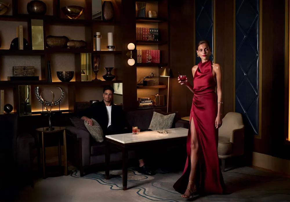 The library lounge at Address Downtown in the evening