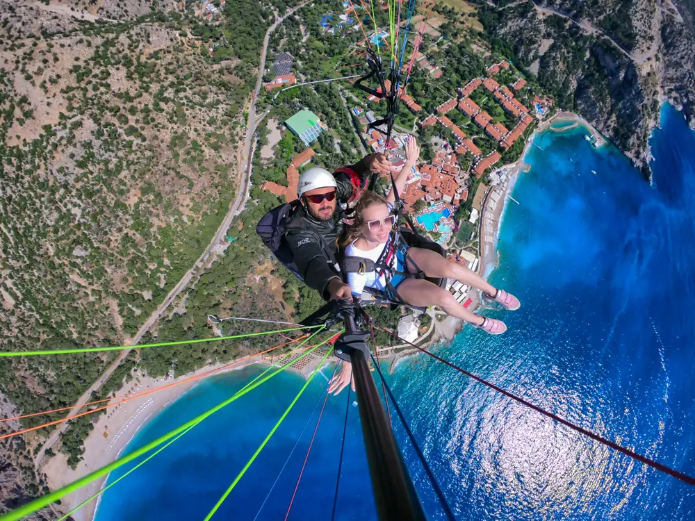 Paragliding high above the beach and lagoon at Ölüdeniz